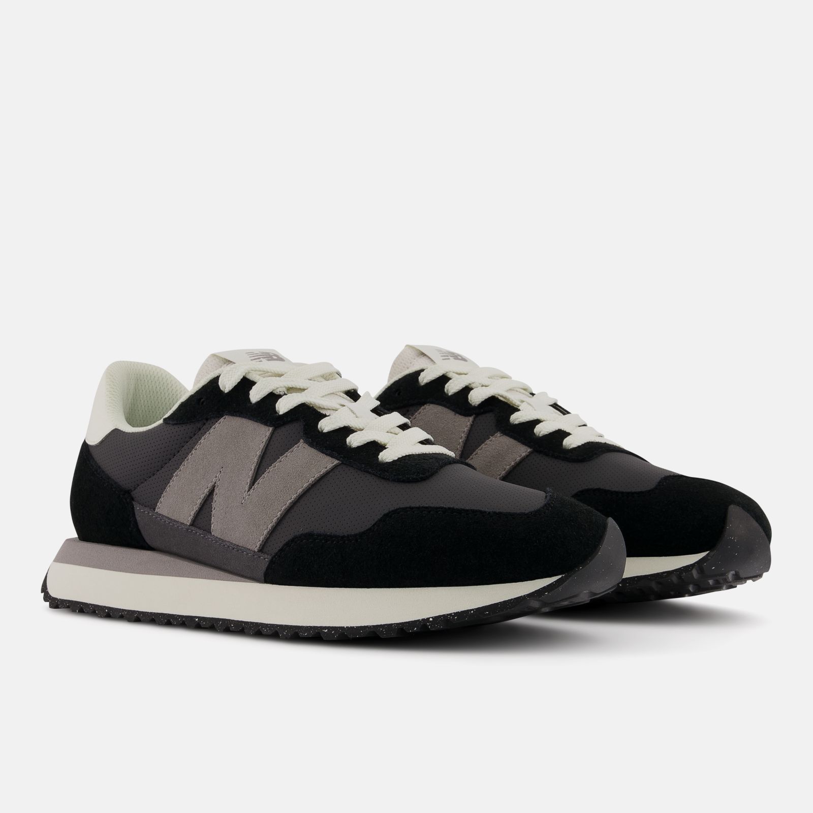 New balance hombre negras 70 hotsell